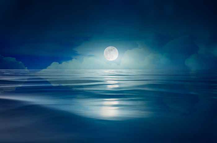"Full moon in the sea at night" Photo of moonlight on water showing blue as the dominant analogous color. "Full moon on the sea at night" Photo by Sarayut Thaneerat